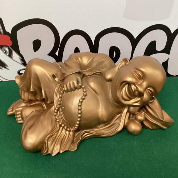 Golden resin Laughing Buddha statue for Asian decor.