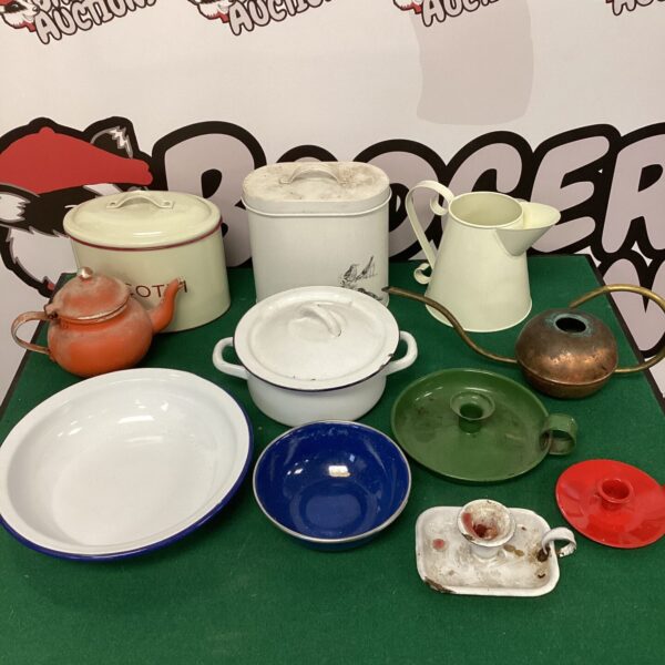 Vintage enamelware lot with blue and white kitchen items.