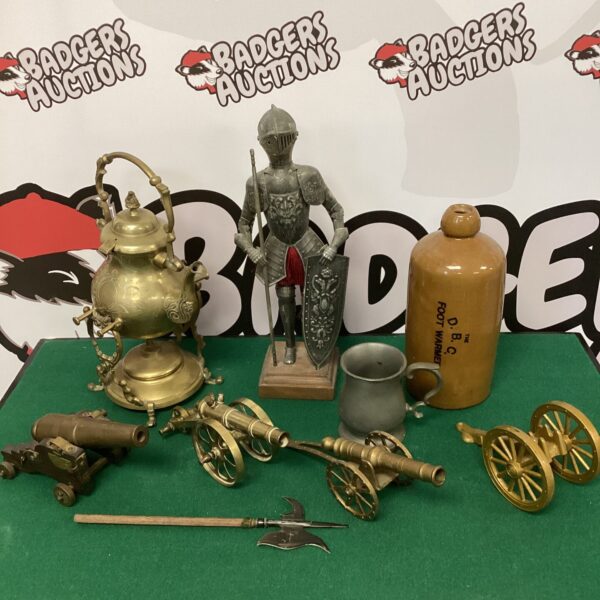 Mixed lot of vintage collectibles including brass cannons and knight.