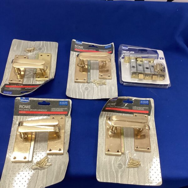 Wickes polished brass door latch in original packaging, vintage style.