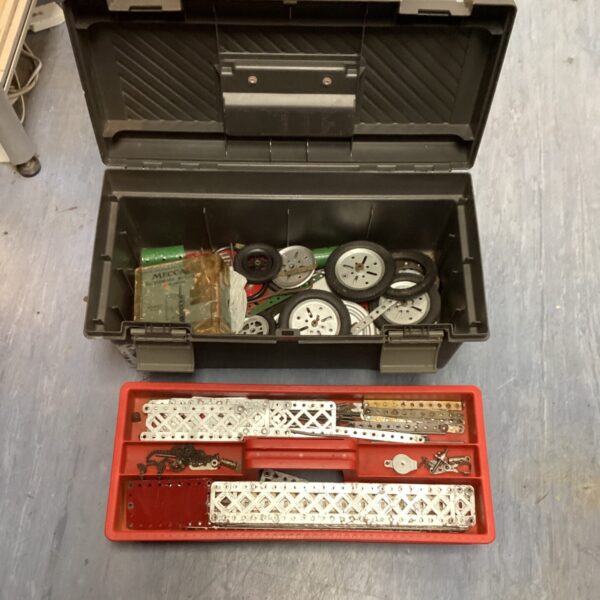 Vintage Meccano parts lot inside a plastic toolbox.