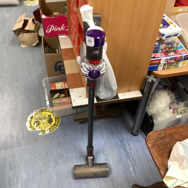 Dyson V8 cordless vacuum cleaner in used condition.
