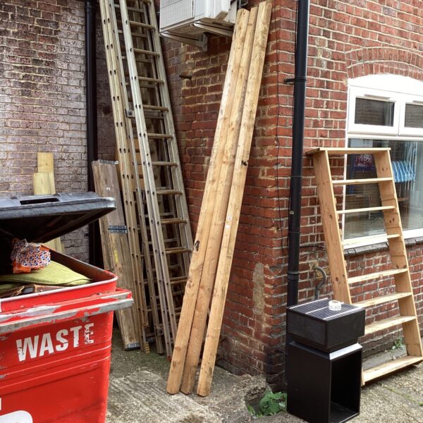 Lot of rough sawn timber planks for DIY projects.