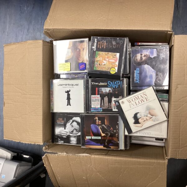 Large lot of mixed genre CDs for music lovers.