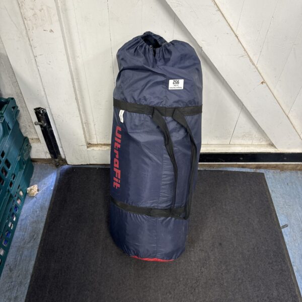 Rolled up Ultrafit four man tent ready for camping.