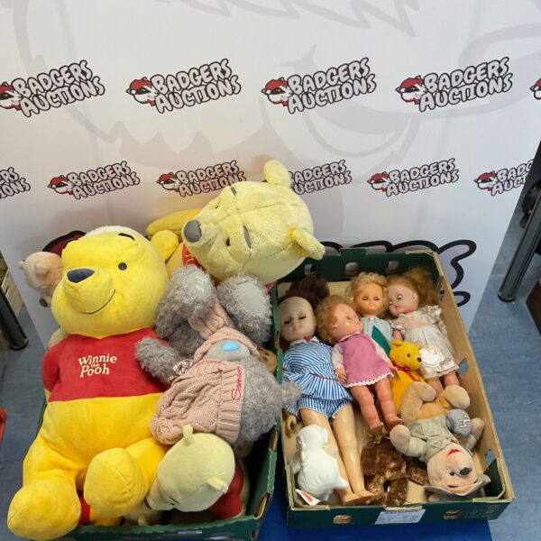 Vintage Winnie the Pooh teddy bear and doll lot for collectors.