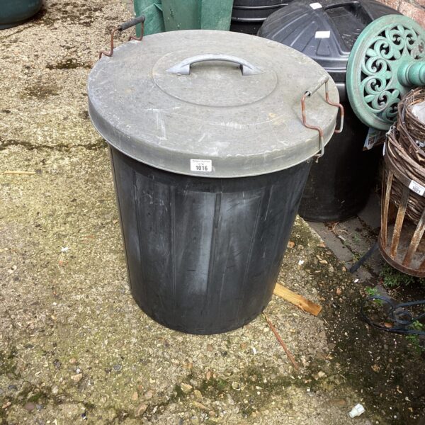 Large plastic garden rubbish bin for outdoor waste.
