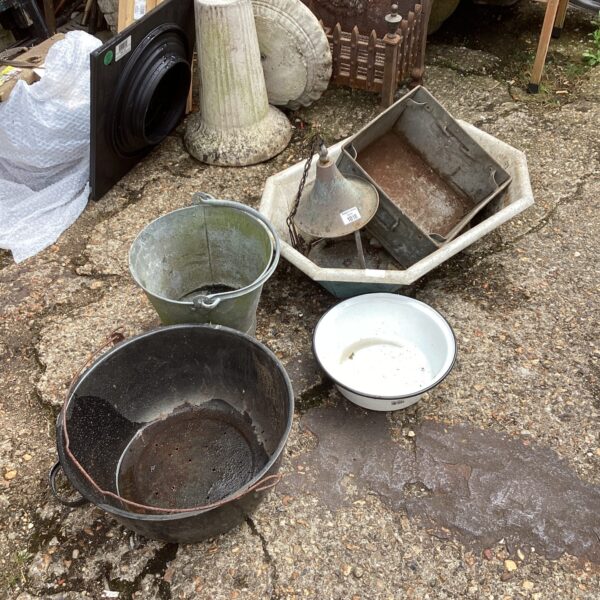 Selection of vintage galvanised garden bowls for rustic garden decor.