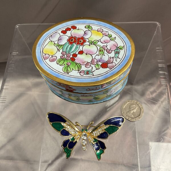Vintage enamelled butterfly brooch and trinket pot set, colourful and detailed.