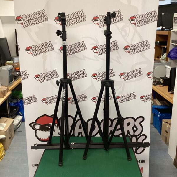 Two black Gorilla tripod stands for camera and lighting support.
