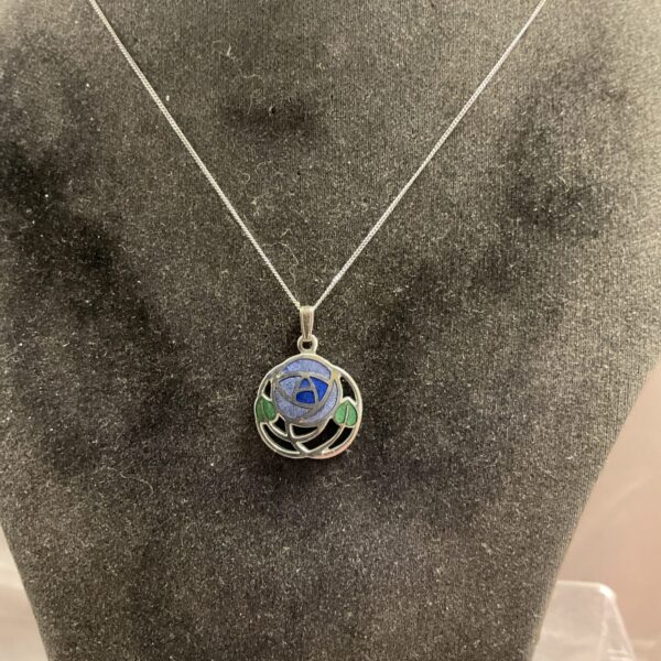 Vintage enamel flower pendant on silver chain, Macintosh style.