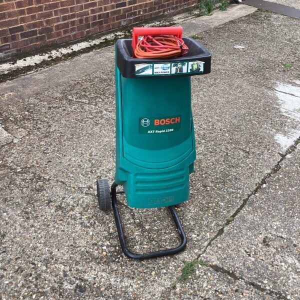 Bosch AXT electric shredder for garden waste and leaf reduction.