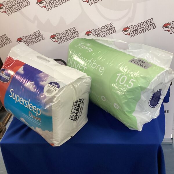 Two duvets, a Silentnight single and Fogarty double, for warm bedding.