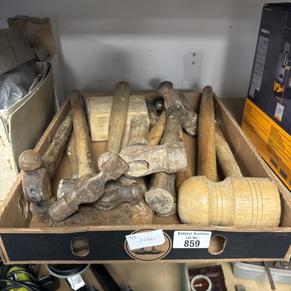 Vintage assorted hammers and mallets in a tool lot.