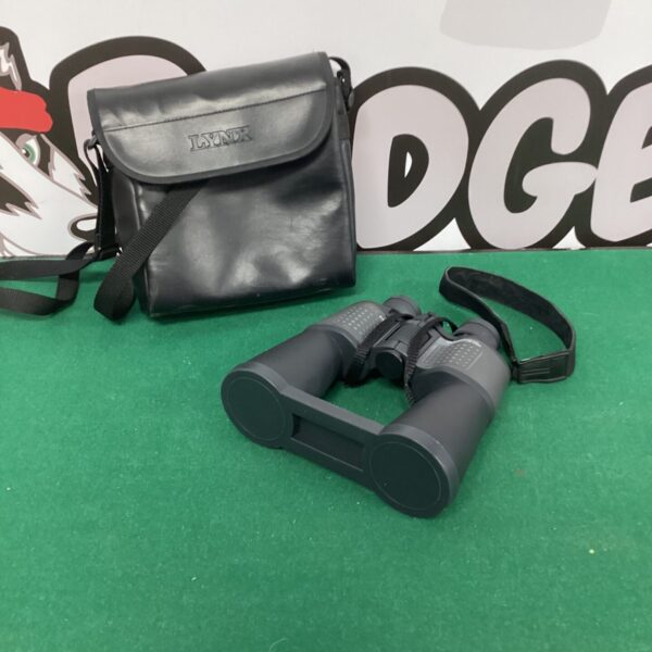 Vintage Lynx binoculars in a leather case, collectible optics.