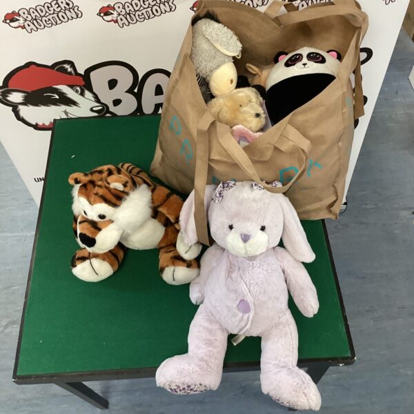 Lot of vintage animal soft toys including a lion, sheep and bunny.