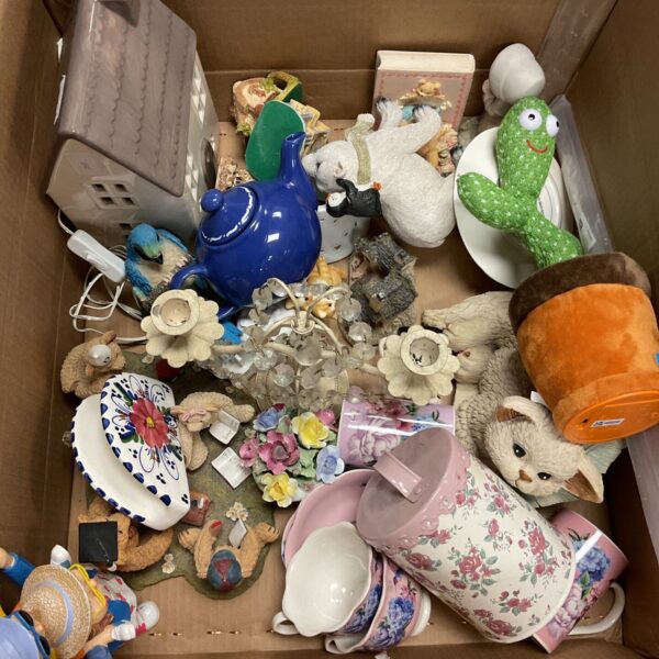 Mixed lot of collectible figurines and ornaments with teddy bear.