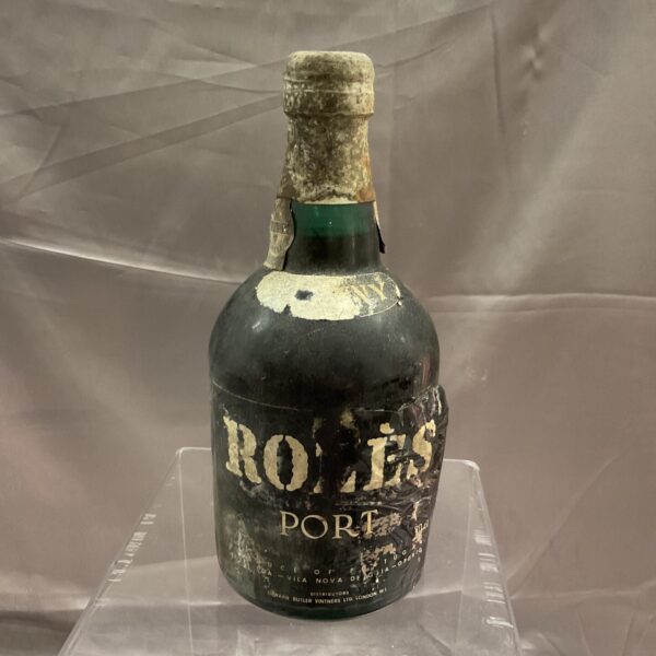 Vintage Rozes Tawny Port bottle with classic label.