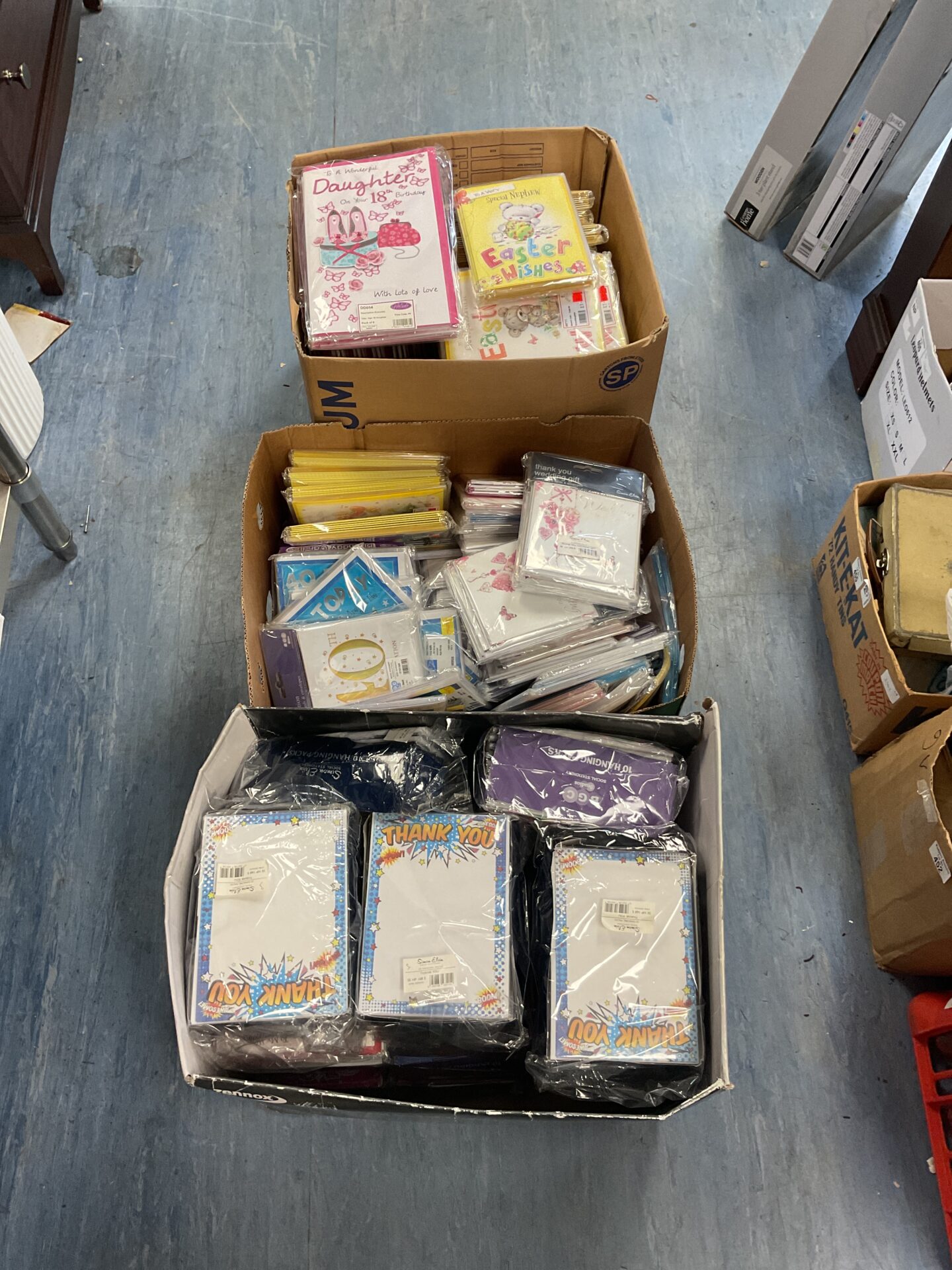 499 Three boxes of birthday cards and other birthday items