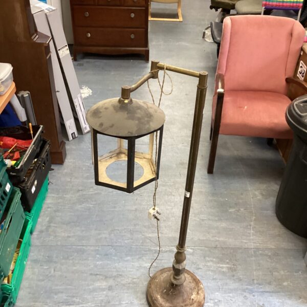 Antique metal standard lamp with lantern shade for restoration.