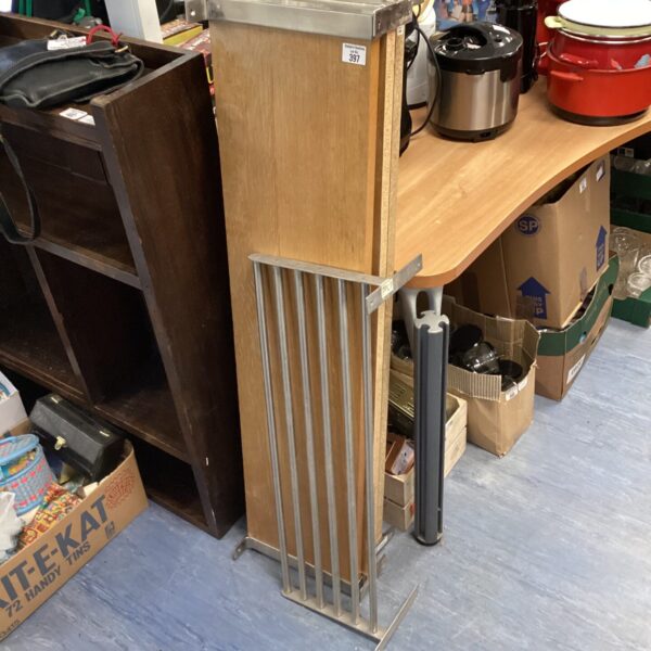 Disassembled vintage teak shelving unit for restoration.