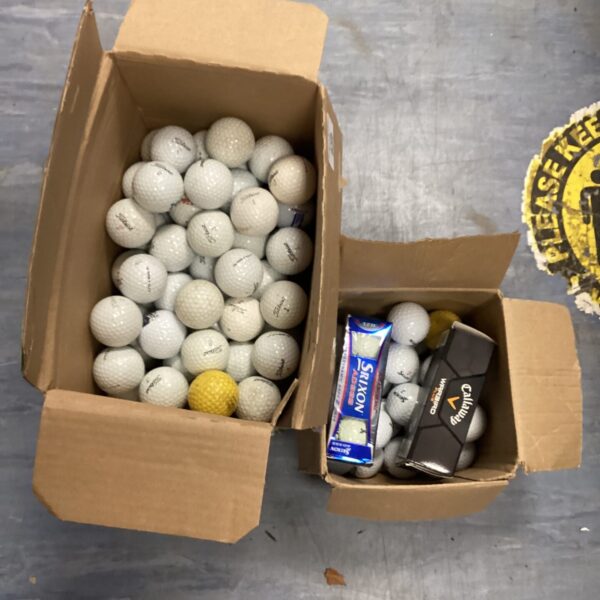 Large lot of used golf balls including Titleist Pro V1.