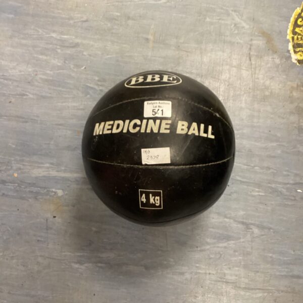 Front view of a used BBE medicine ball for fitness training.