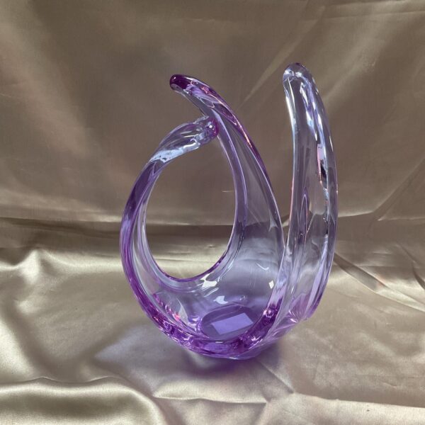 Vibrant purple Murano style glass bowl with flowing form.