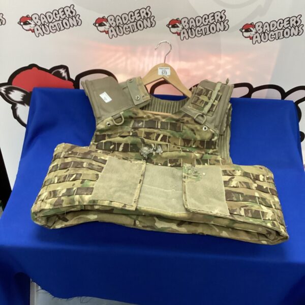 Used bulletproof vest with adjustable straps and modular design.