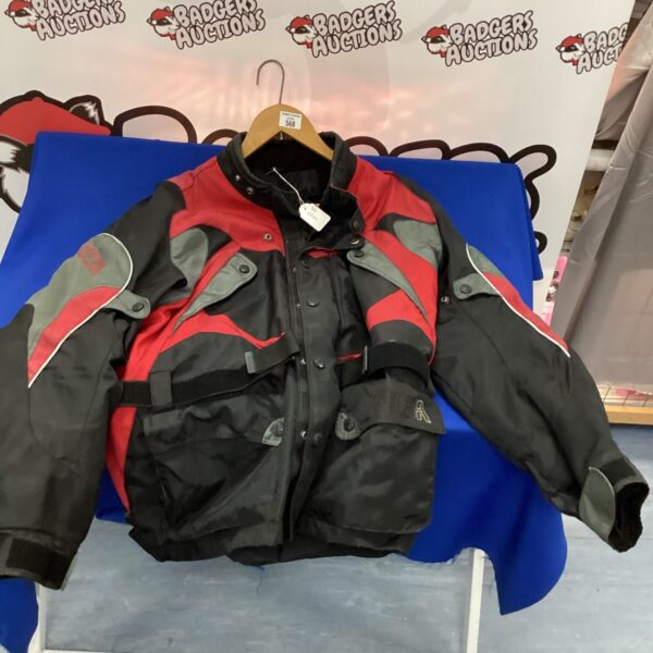 Red and black Richa motorcycle jacket size XXL for riders.