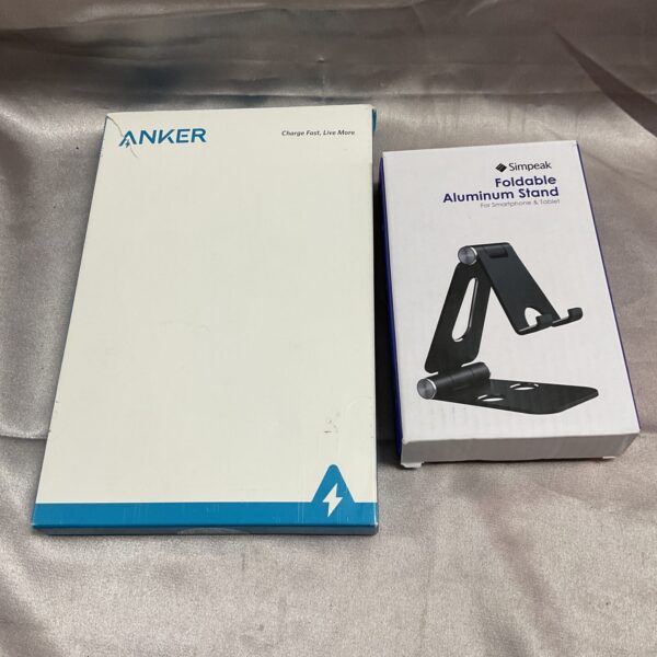 Anker wireless charging pad with sleek aluminium phone stand.