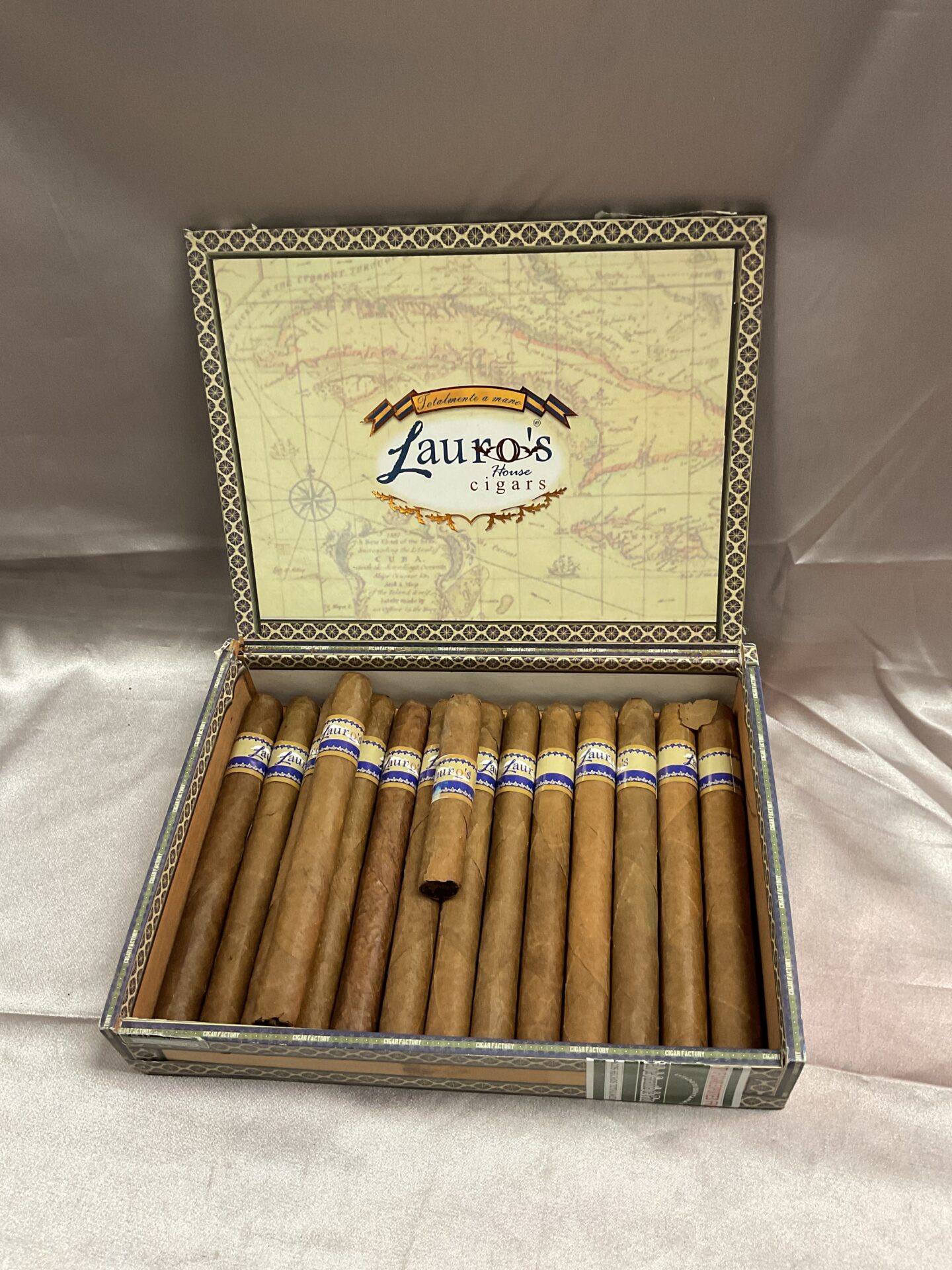 665 Half box of Laura’s house cigars