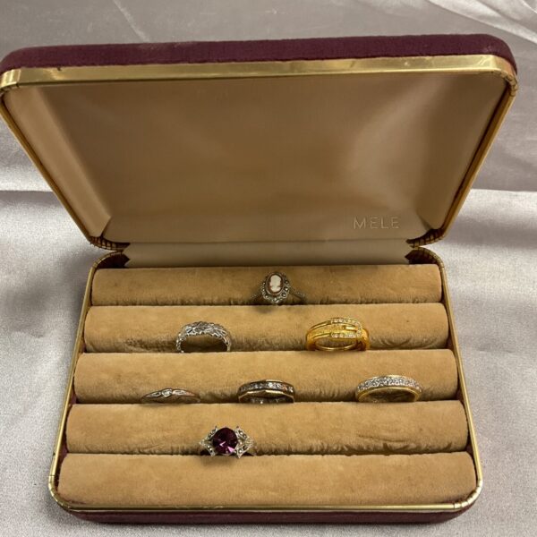 Vintage ring collection presented in a velvet box.