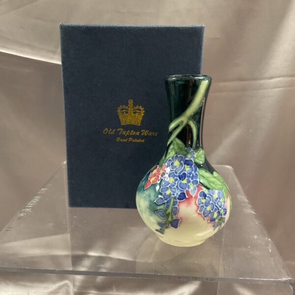 Vintage Tipton Ware posy vase with vibrant floral design.