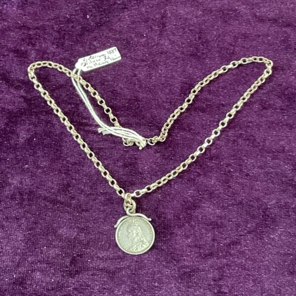 Antique silver pendant with 1887 coin on delicate chain