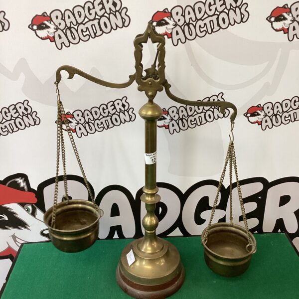 Large vintage brass balance scales with hanging pans.