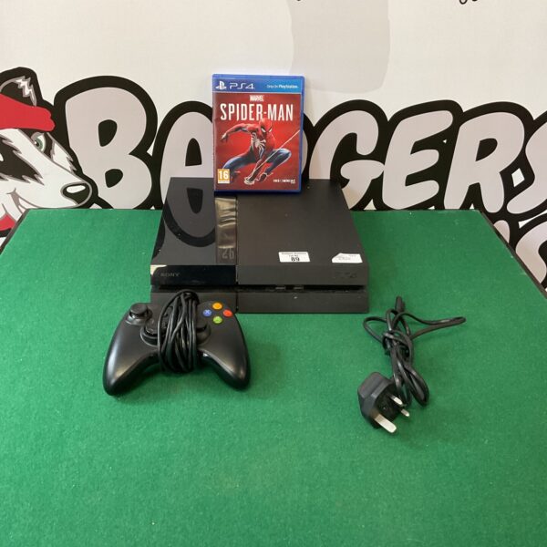 PS4 console bundle with Marvel Spider-Man game and Xbox controller.