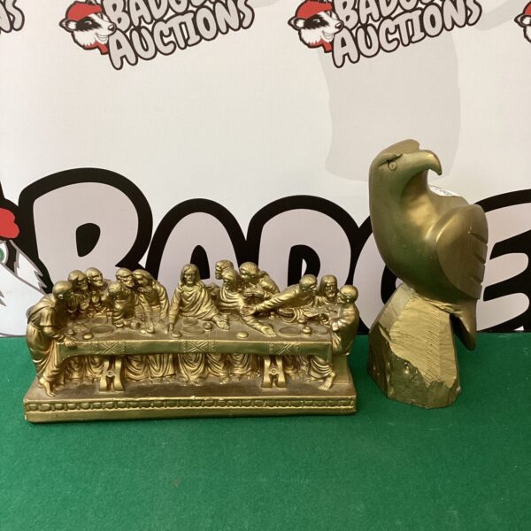 Vintage Last Supper plaster ornament and carved wooden eagle.