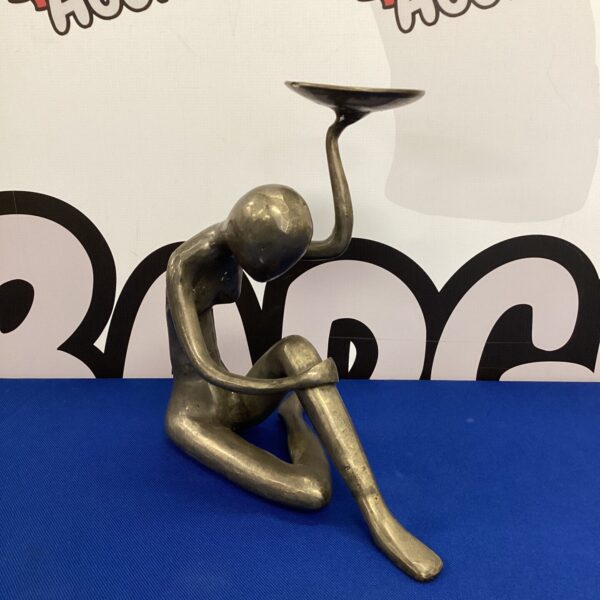 Vintage nude lady candle holder sculpture in dark metal.