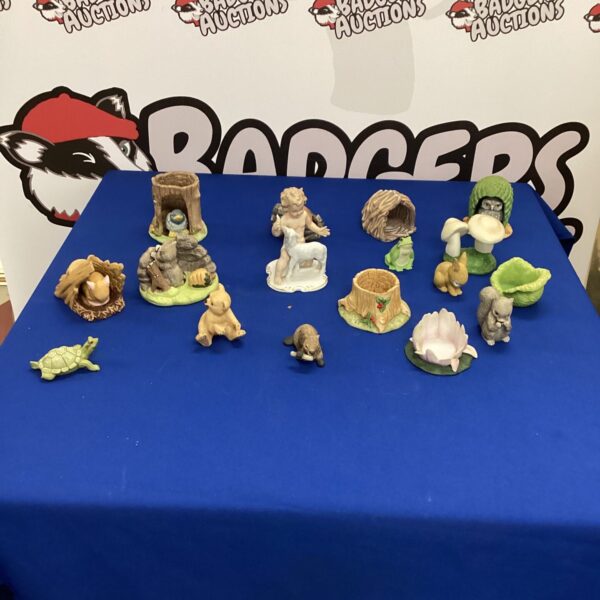 Collection of hand-painted porcelain animal figurines for collectors.