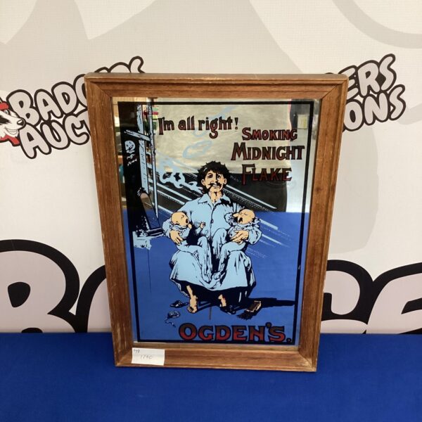 Vintage Ogdens Midnight Flake tobacco advertising mirror with gentleman illustration.