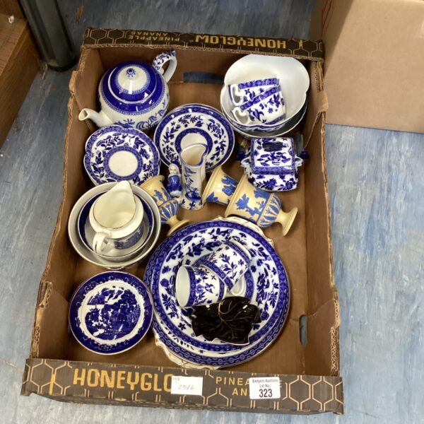 Vintage blue and white china collection on display.