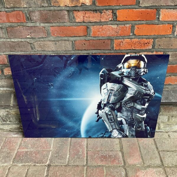 Detailed Halo Master Chief metal wall art panel for gaming decor.