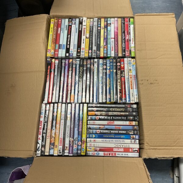 Large lot of assorted DVDs for home entertainment.