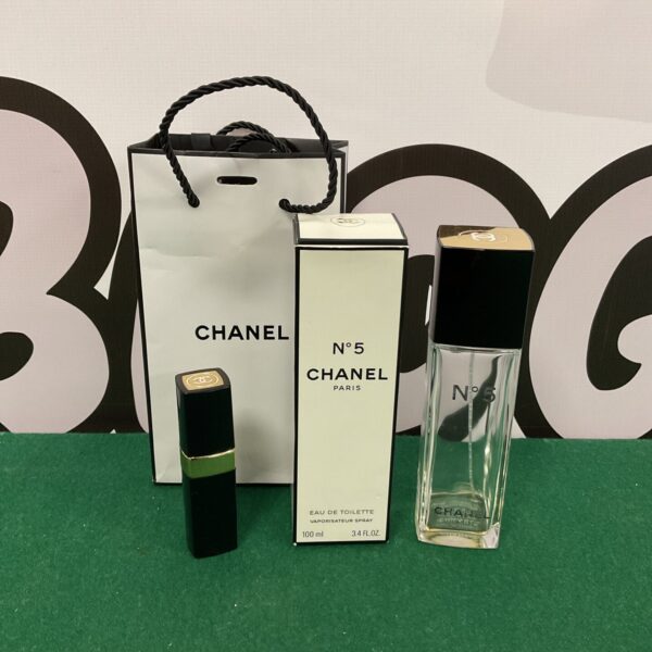 Vintage Chanel No 5 bottle, a classic perfume collectible.