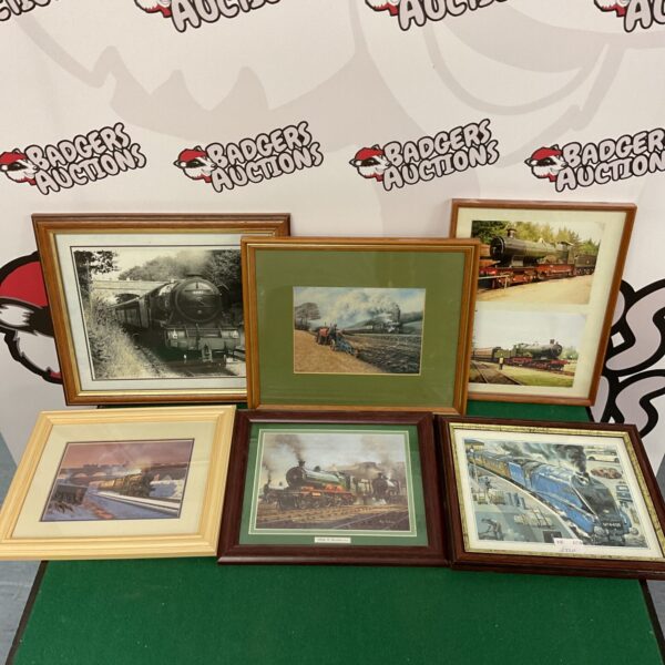 Set of six framed train prints and photographs for railway enthusiasts.