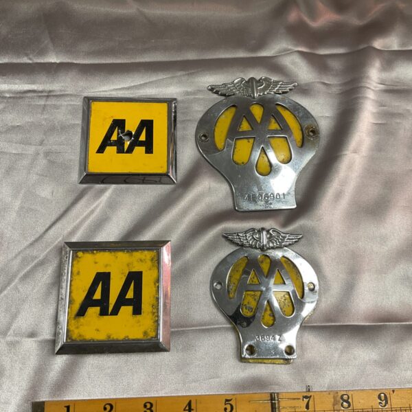 Lot of four vintage AA car badges for classic cars.