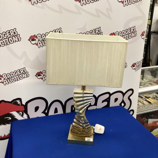 Vintage glass table lamp with twisted column and cream shade.