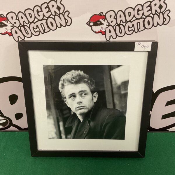 Framed black and white photograph of James Dean, the iconic actor.