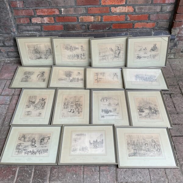 Collection of antique French pencil drawing prints on display.
